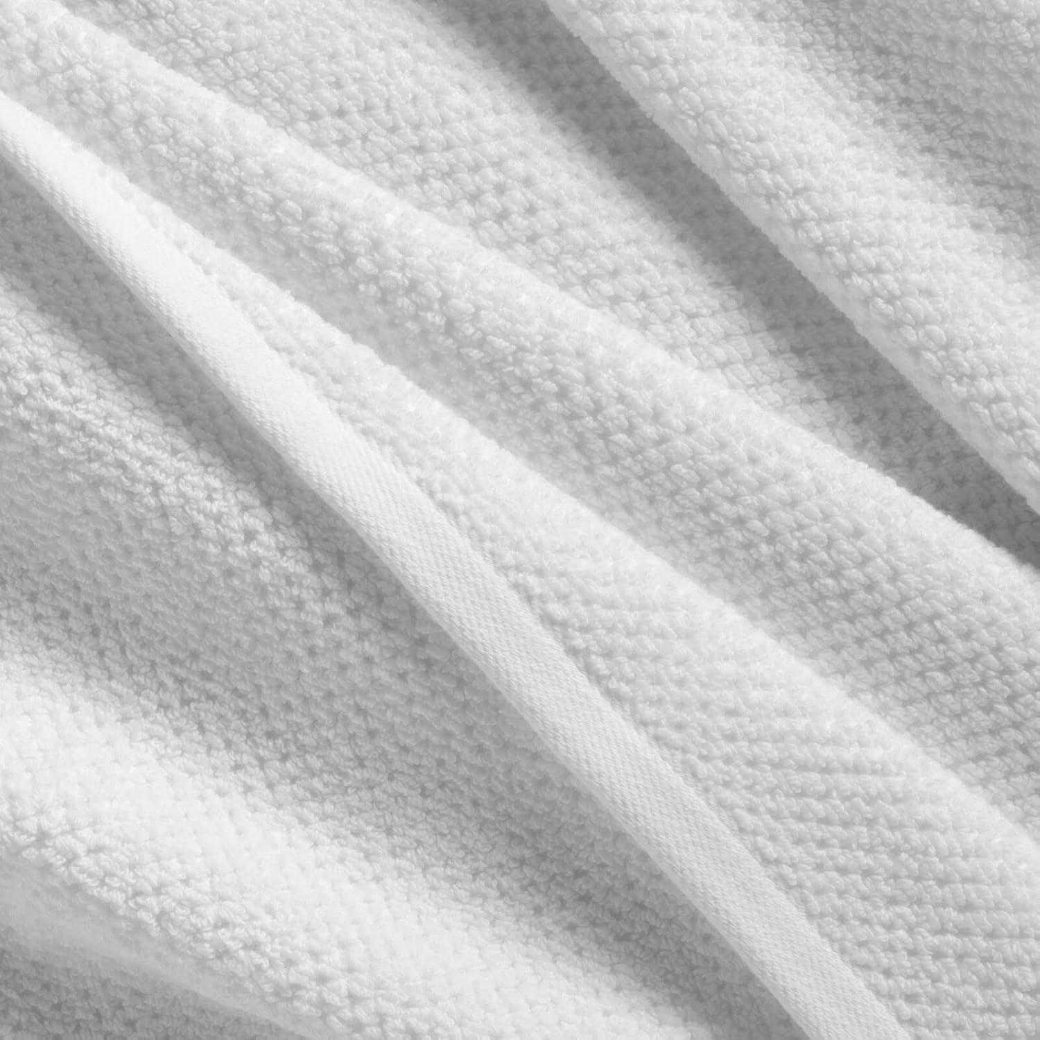 imageNate Home by Nate Berkus 100 Cotton Textured Rice Weave 4Piece Washcloth Set  Soft and Absorbent Solid Bathroom Towels from mDesign  Set of 4 Snow White