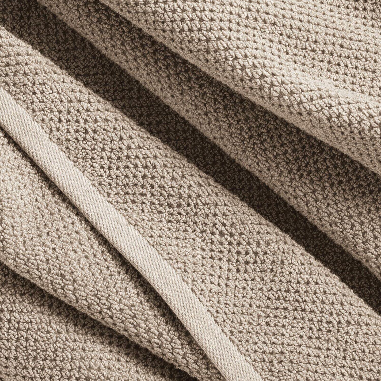 imagemDesign Nate Home by Nate Berkus 100 Cotton Textured Rice Weave Washcloths Set of 4  Soft and Absorbent Solid Bathroom Towels from 4 Pack  Fossil Beige