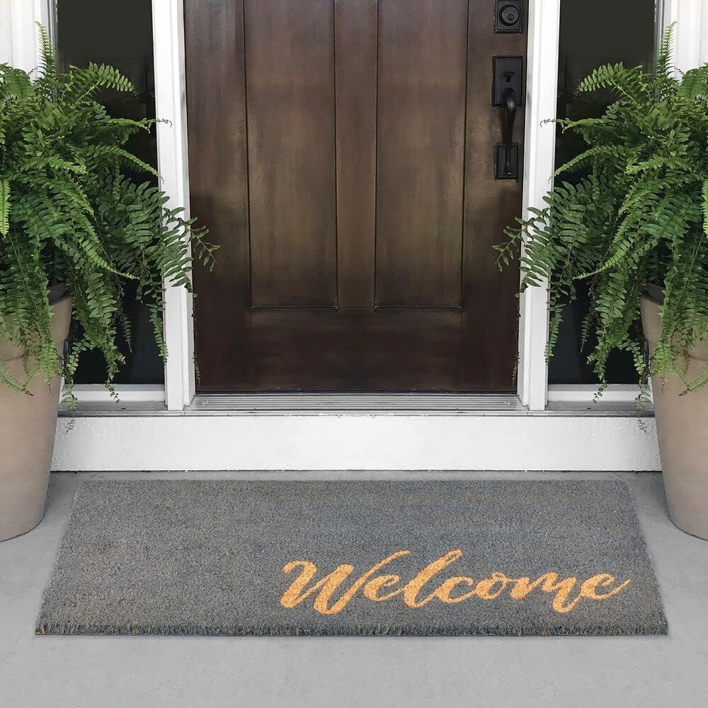 imagemDesign Rectangular Coir and Rubber Entryway Welcome Doormat with Natural Fibers for Indoor or Outdoor Use  Decorative Tree Design  Minimalistic Design  BlackWhiteGrey Cursive Welcome
