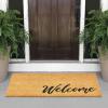 imagemDesign Rectangular Coir and Rubber Entryway Doormat with Natural Fibers for Indoor or Outdoor Use  Neutral Design  Stripe Border  Minimalistic NaturalBlackNatural Cursive Welcome