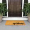 imagemDesign Rectangular Coir and Rubber Entryway Doormat with Natural Fibers for Indoor or Outdoor Use  Neutral Design  Stripe Border  Minimalistic NaturalBlackNatural Cursive Welcome